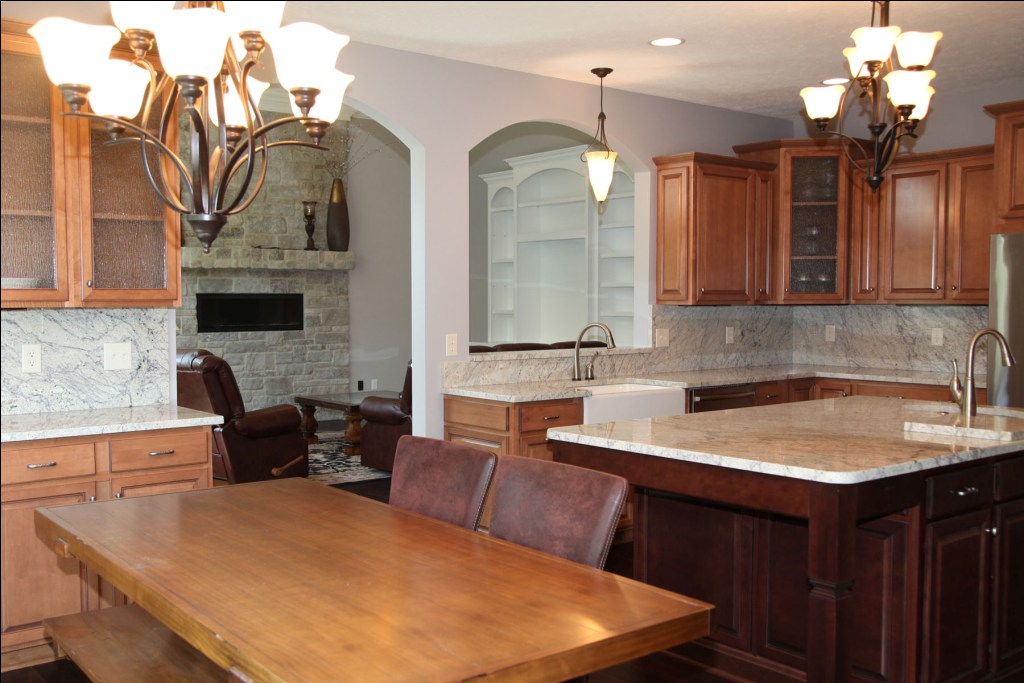 Custom Home Kitchen Stained Wood Cabinetry Dining Room Pass