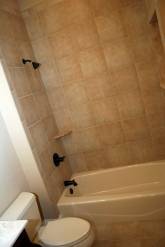Master Bathroom Tub, Granite Tile / Soap Dish, Antique Brass Finish Plumbing Fixtures