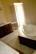 Master Bath Oval Whirlpool Tub, Tile / Hardwood Platform Enclosure, Large Linen / Storage Closet