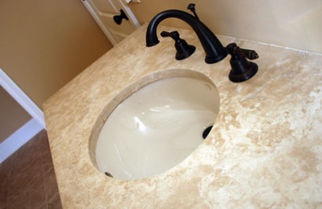 Bathroom Sink Close-up, Marble Countertop, Antique Brass Plumbing Fixtures