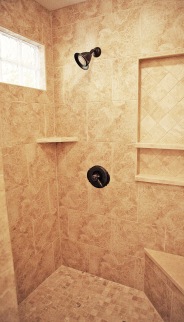 Walk-In Shower in Master Bathroom, Granite Tile, Built-In Toiletry Shelves